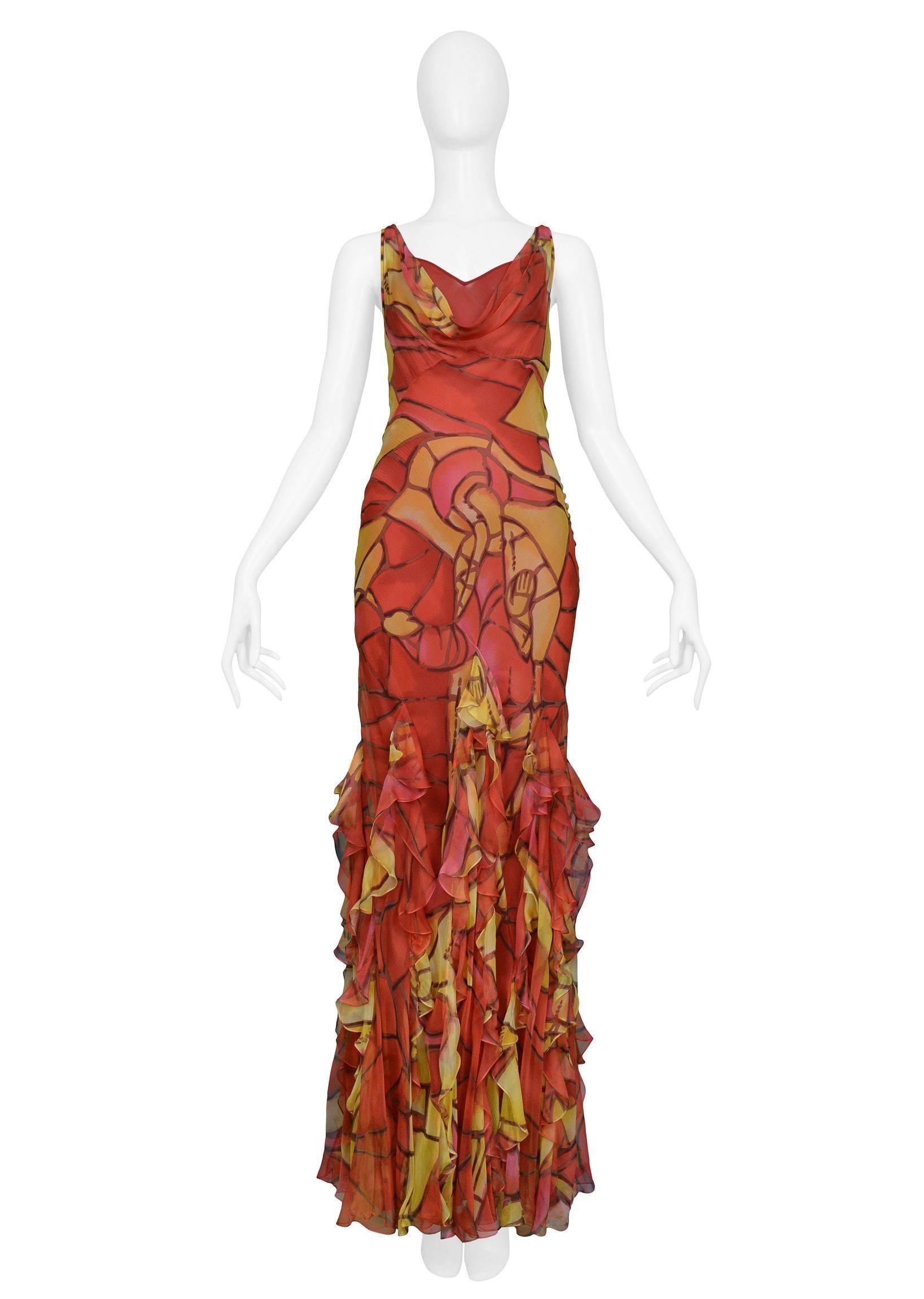 Vintage Christian Dior by John Galliano chiffon bias cut evening gown with stained glass print, covered buttons at side, low open draped neckline ,and rows of ruffles at skirt hem. Circa 1990's. This listing is for gown only. 

*Please see our other