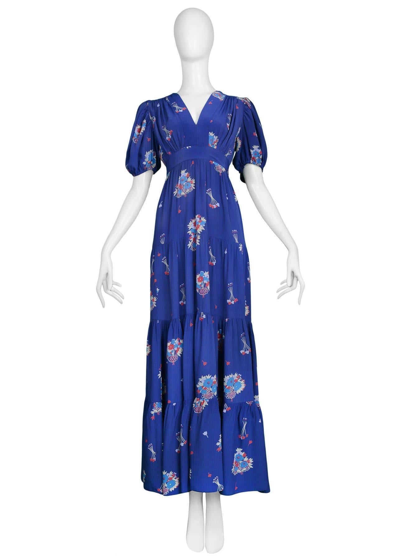 Vintage blue rayon tiered Ossie Clark peasant style maxi dress with Celia Birtwell print. Open cut front, puff sleeves, zipper at back. Circa 1960's/1970's.