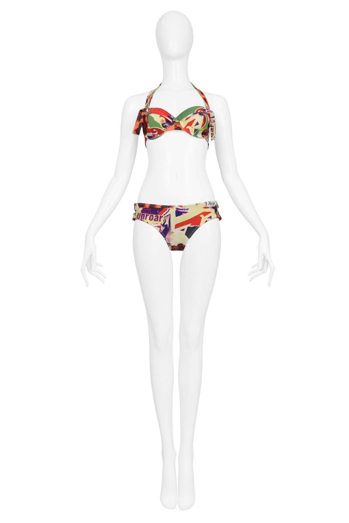 John Galliano for Christian Dior 'Victim' print bikini with buckle detail. Never worn. Collection Spring / Summer 2003.

This piece has never been worn and has all of its original tags. 

Size: French 40 

