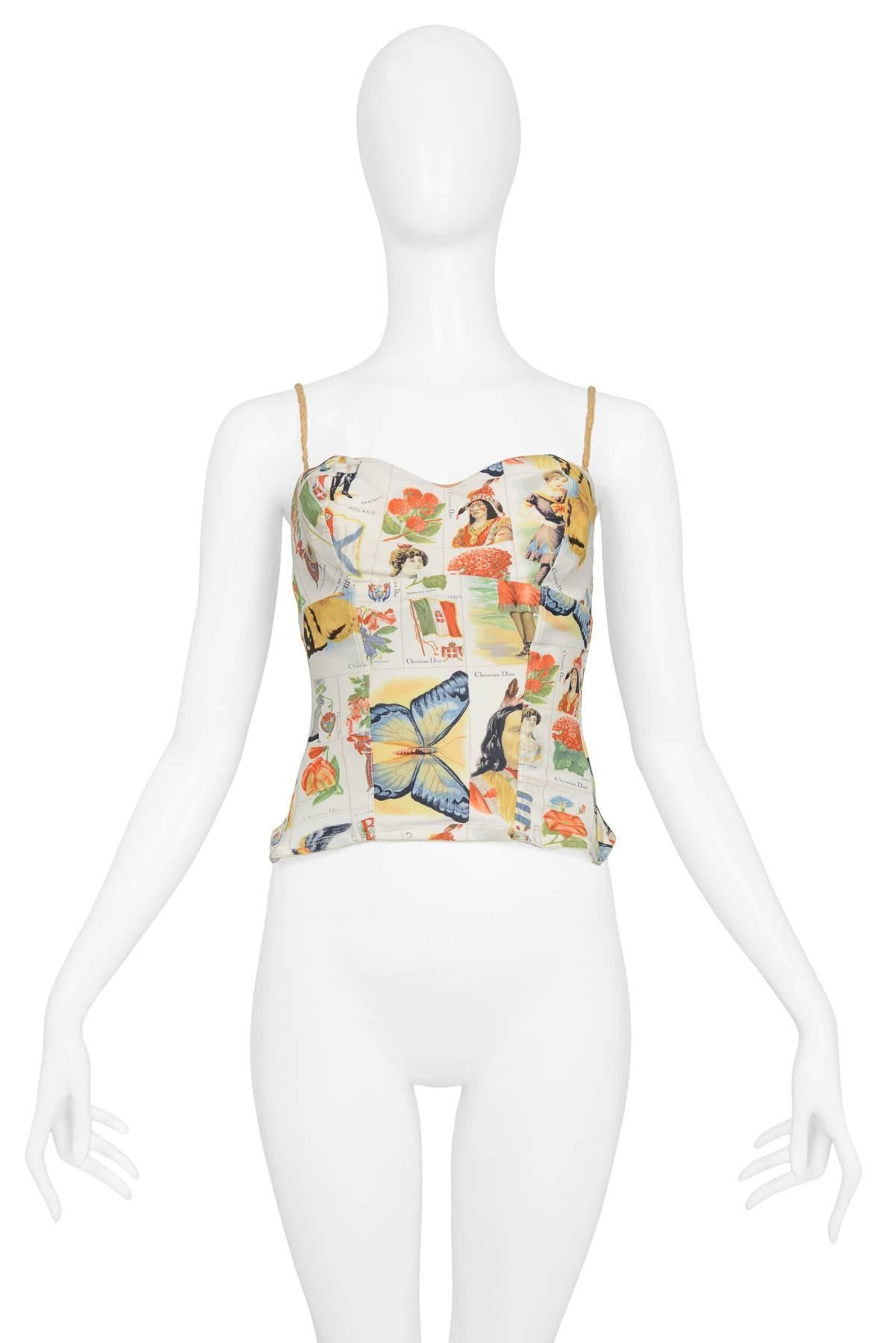 Christian Dior by John Galliano ivory corseted bustier with stamp print throughout and braided suede lace-up closure at back. This piece features removable straps for a strapless option.

Excellent Condition.

Size: 36
