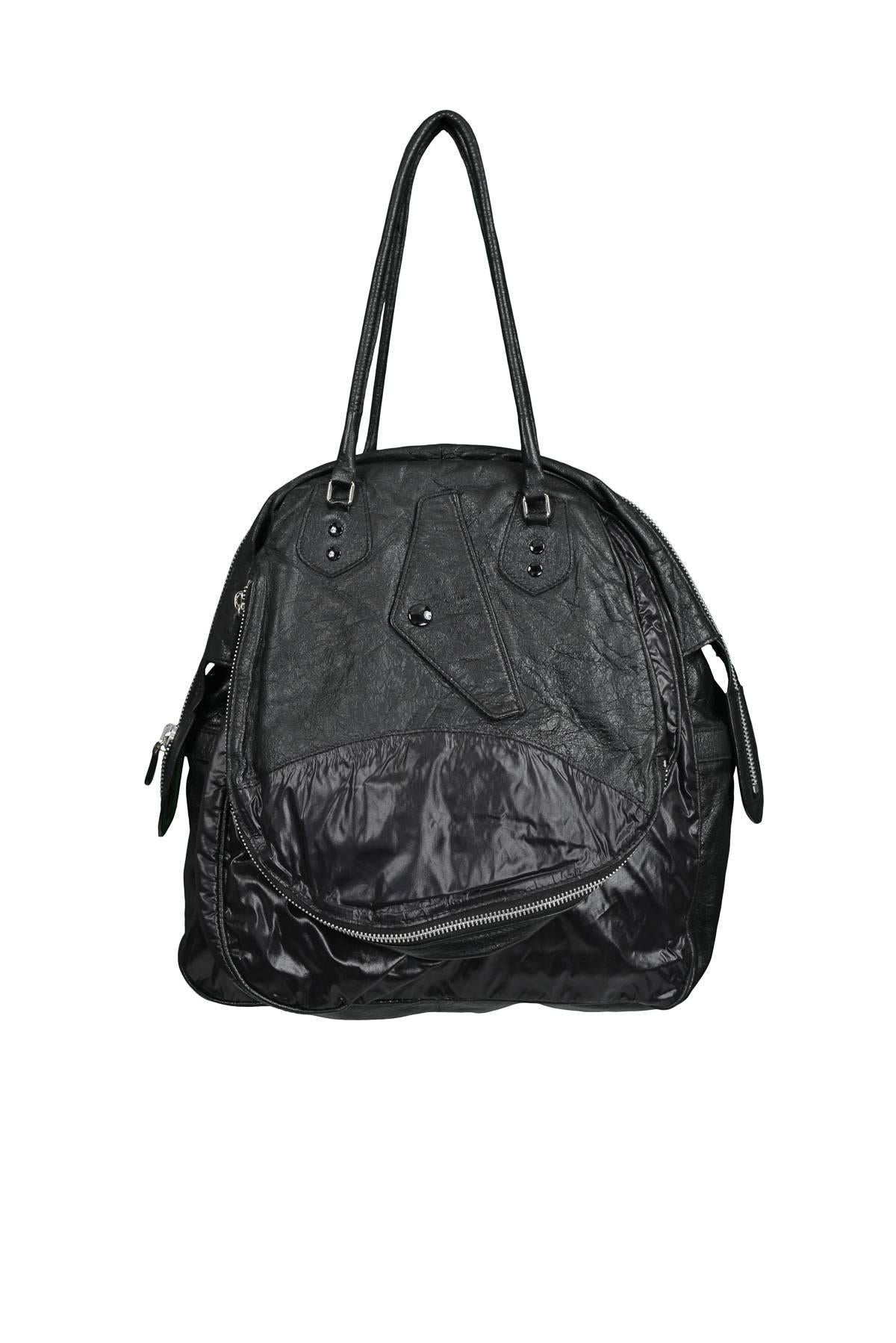 Balenciaga by Nicolas Ghesquiere black on black parachute collection bag with leather and nylon insets. Collection 2003. 

Excellent Condition.
