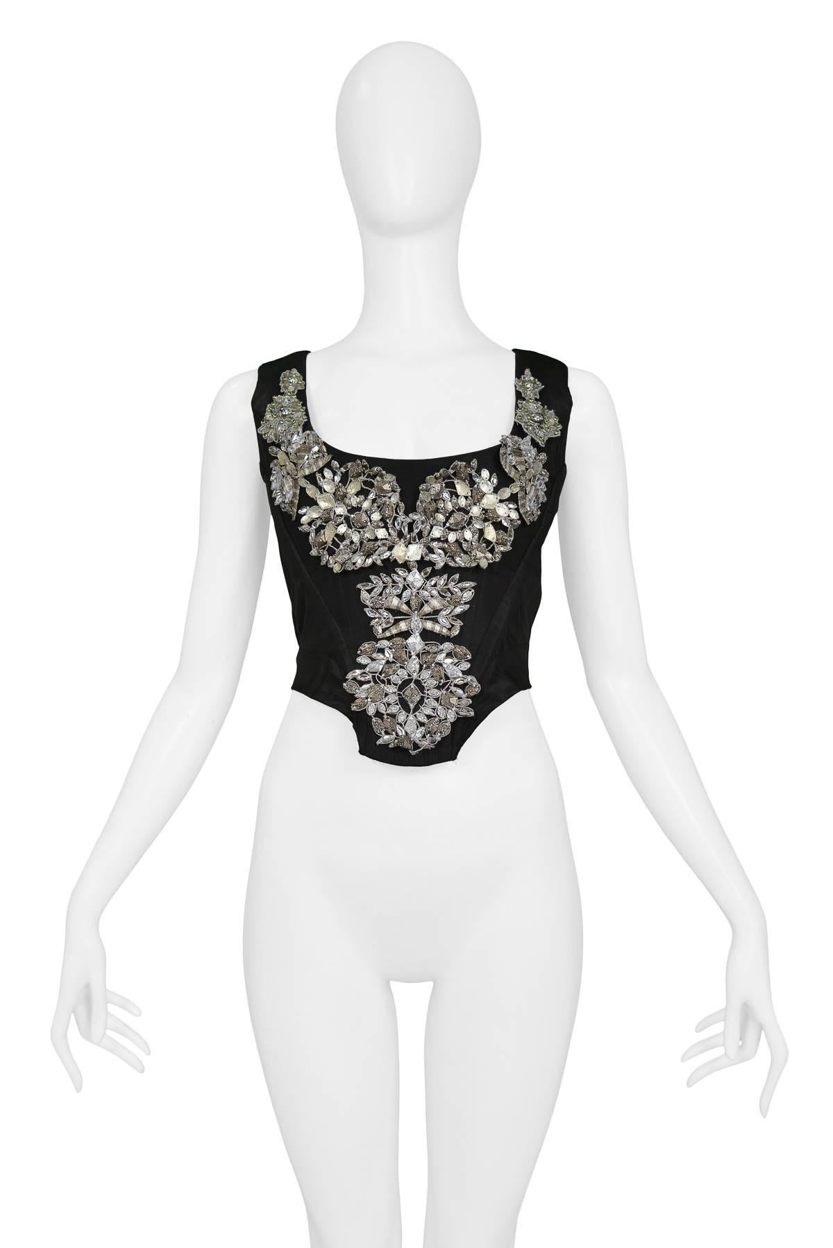 Vivienne Westwood crystal embellished black taffeta corset with back zip closure. 

Excellent Condition.

Size: Marked a UK 10, would best fit a size 0/2. 
