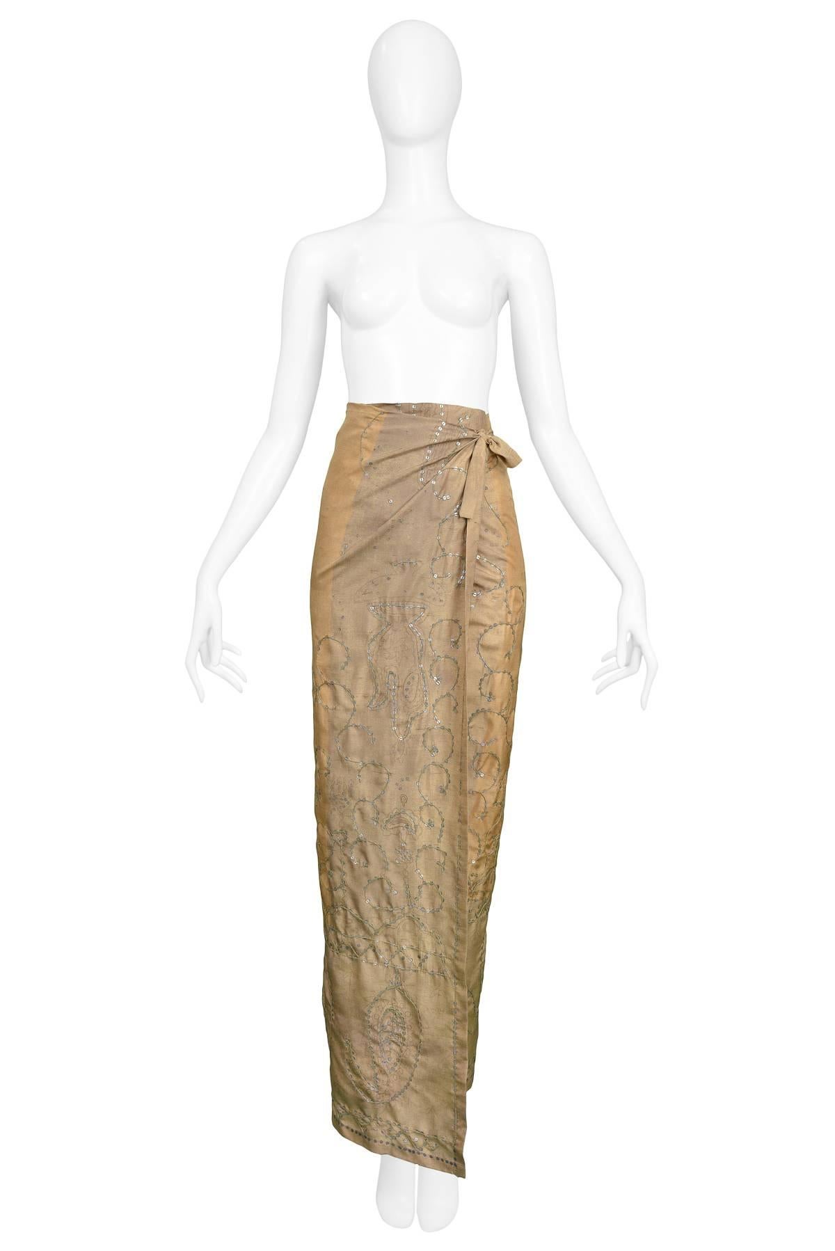 Vintage Dries Van Noten khaki silk embroidered India Collection duotone sarong style wrap skirt and allover sequin embroidery. Collection 1997.

Size: 36 

Excellent Condition.

