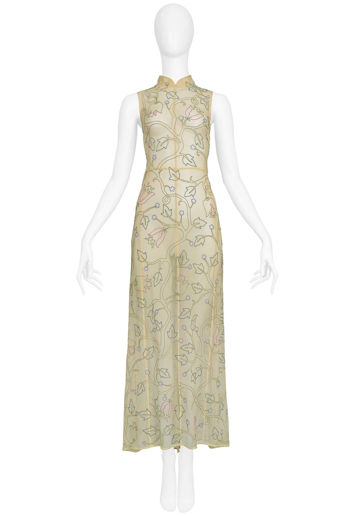 Vintage Prada butter yellow mesh tea length dress with floral embroidery throughout & nehru collar. Back snap closure.

Excellent Condition.

Size: Small

