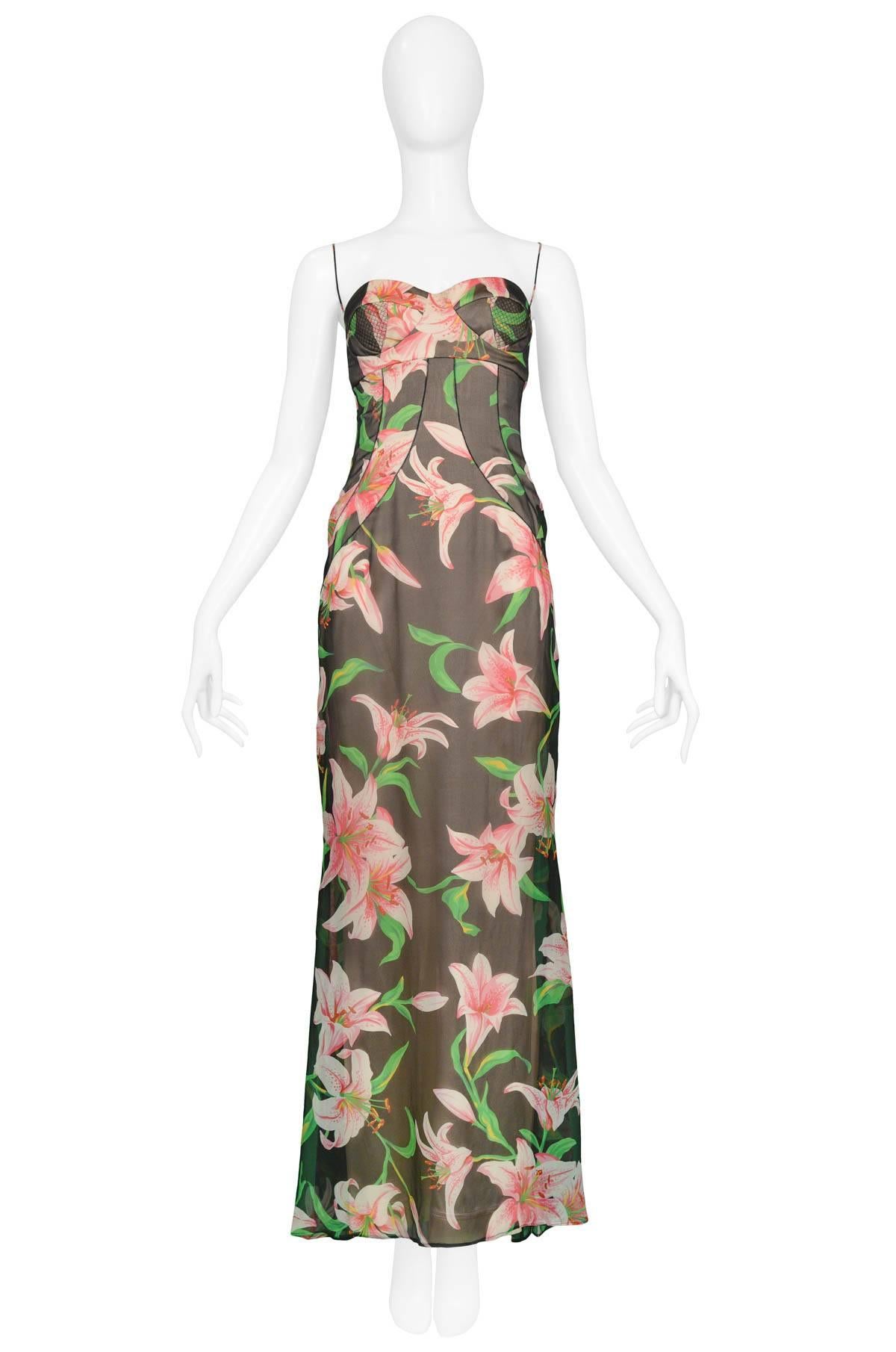 Vintage Dolce & Gabbana silk bustier gown with all-over 'Stargazer' Lily Print. Gown features back zip closure and stitching detail throughout. 

Excellent Condition.

Size: Italian 42.