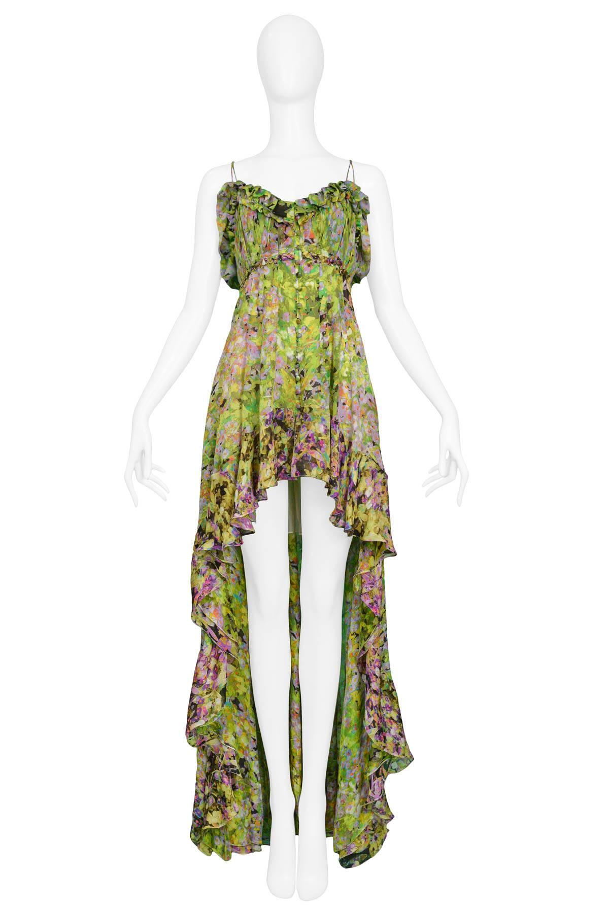 Roberto Cavalli green chiffon floral mini dress with train, sweetheart neckline with ruffle trim, front button closure & gathered flounce hem. 

Excellent Condition. 

Size: Italian 40 