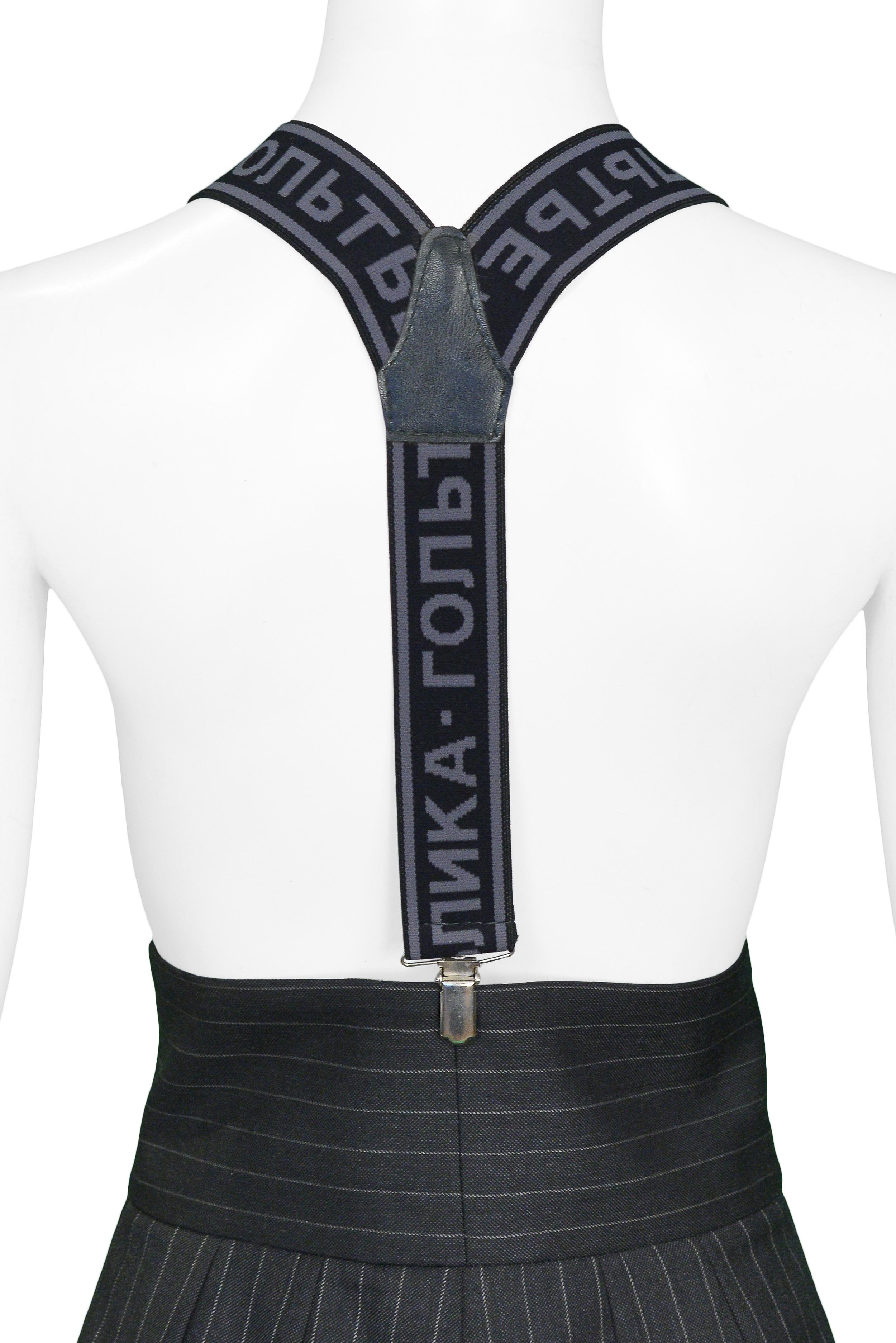 Vintage Jean Paul Gaultier black Russian Constructivist suspenders featuring grey seemingly Russian text, knickel hardare & leather detail at back. 

Excellent Condition.

Size: O/S