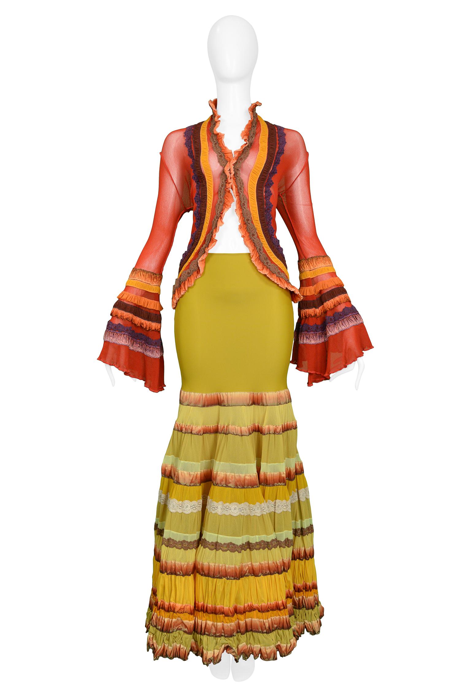 Vintage Jean Paul Gaultier multi-color 'Frida' ensemble. The ensemble features a chartreuse silk jersey mermaid skirt with colorful interchanging fabrics such as lace, mesh & ribbon. The matching red blouse is also adorned with multi-fabric insets,