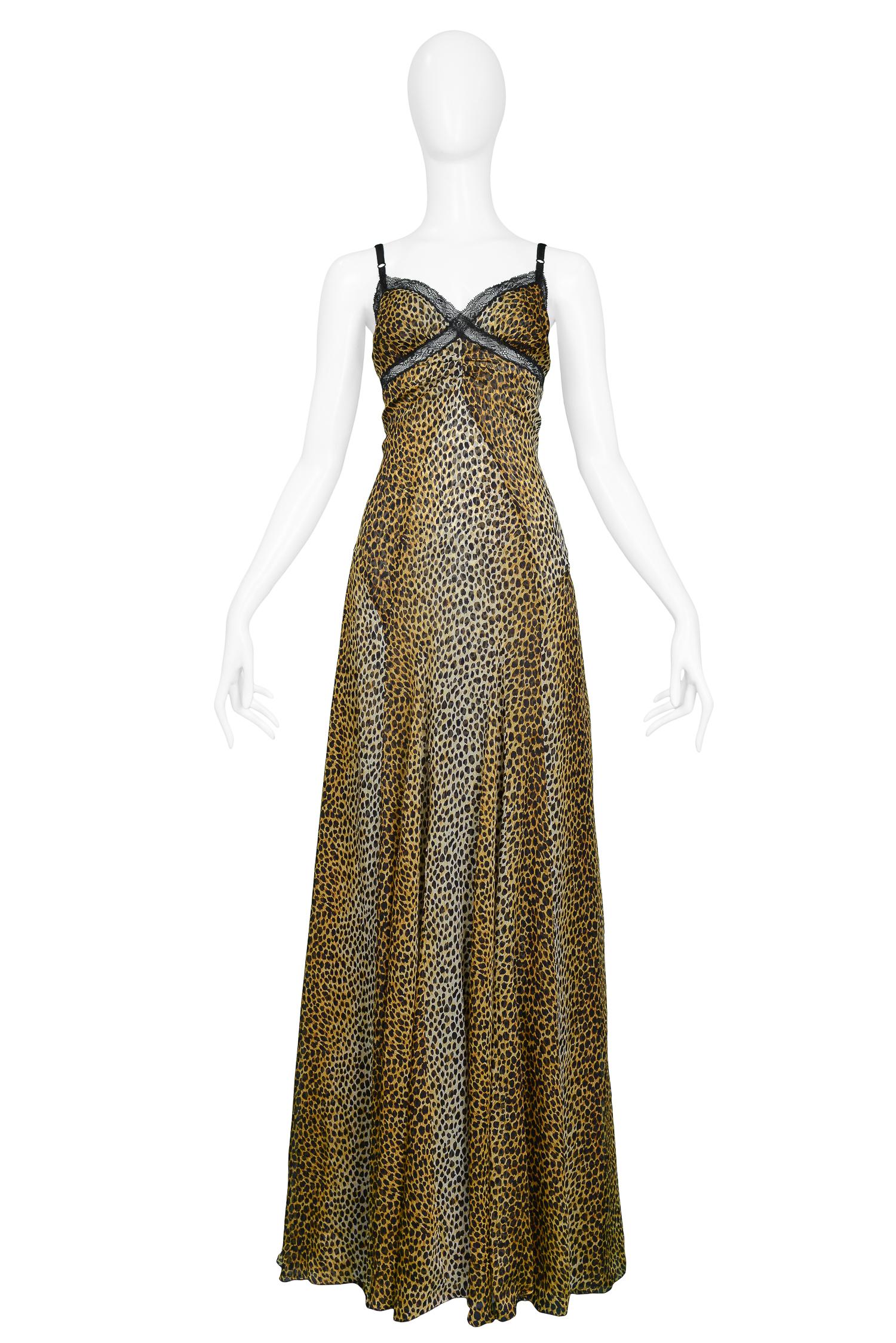 Vintage D&G by Dolce & Gabbana leopard print silk slip gown with black lace insets at chest, train at hem and back zipper closure.

Excellent Condition.

Size: 40