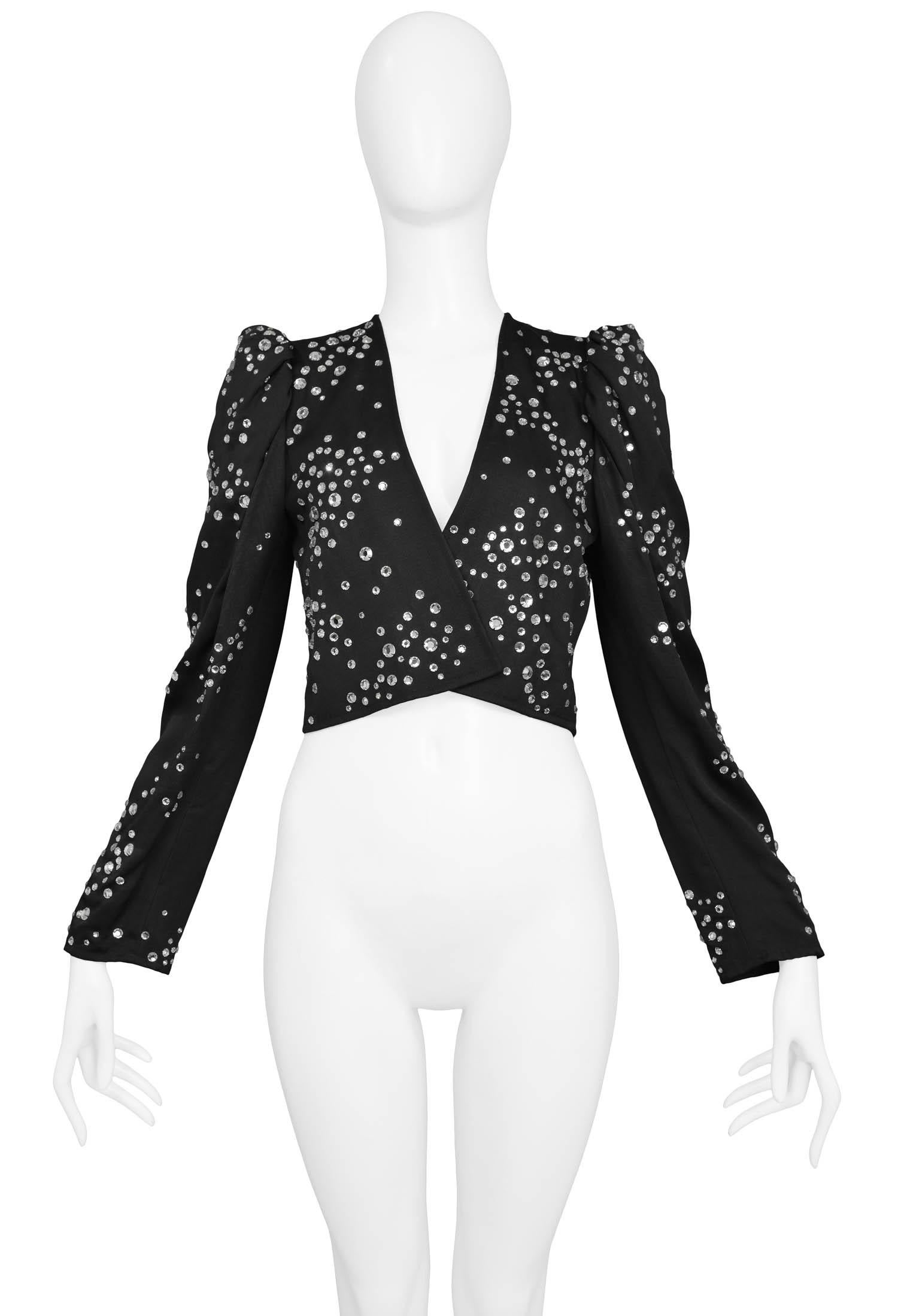 Vintage Yves Saint Laurent black silk faille jacket featuring all-over clear crystal studded embellishments & structured shoulders with gathering. 1983 Collection. 

Excellent Condition.

Size: 36

