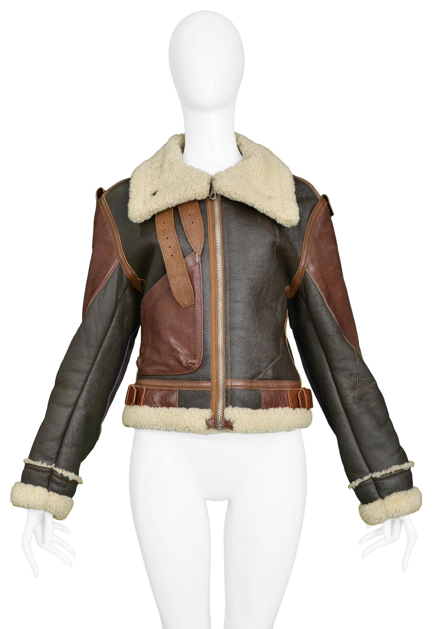 Vintage Nicolas Ghesquière for Balenciaga brown leather & cream shearling 'Palma' aviator jacket featuring buckle details throughout and paneling in various shades of brown. A runway piece from the Autumn/Winter 2003 Collection.

Excellent/Pristine
