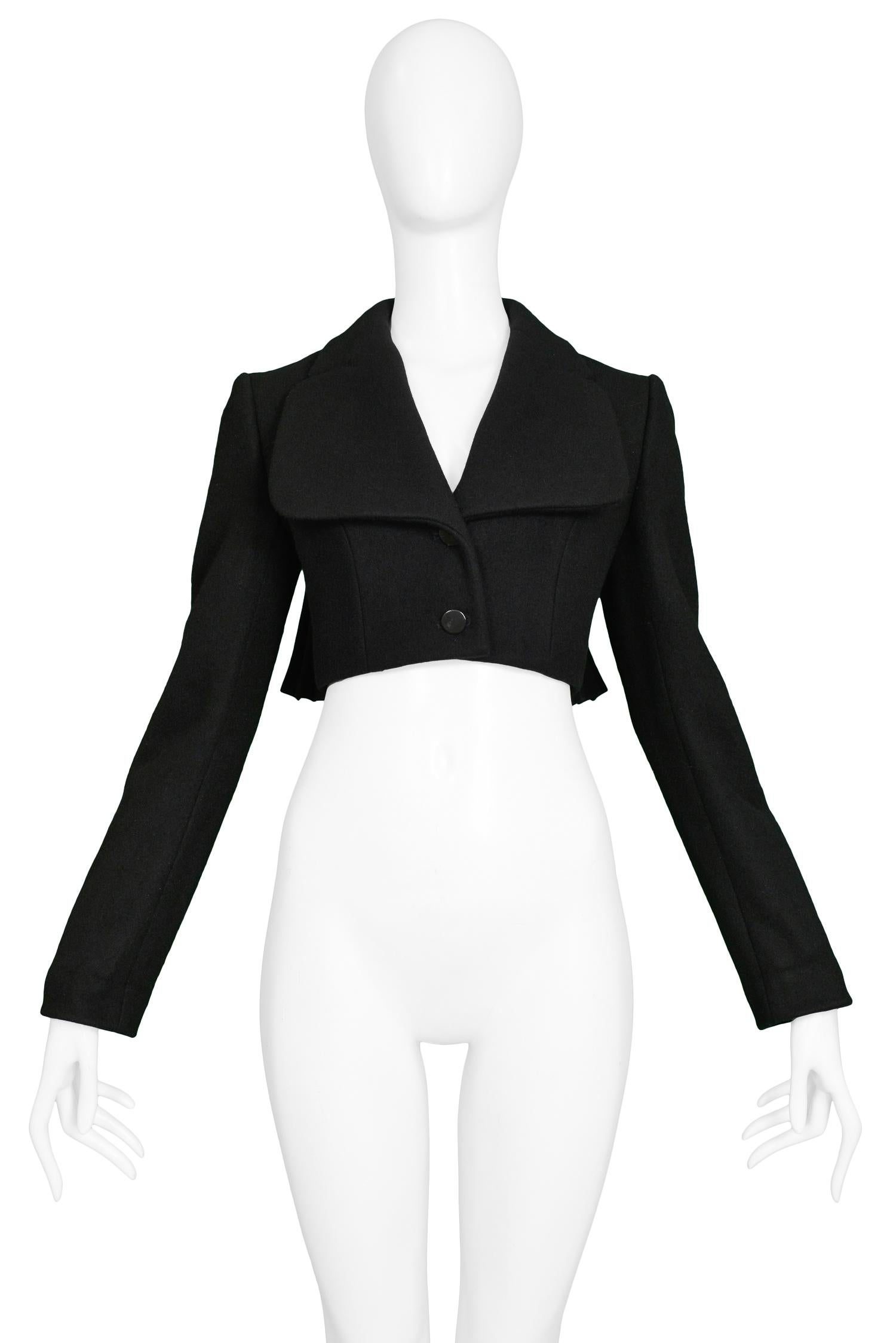 Vintage Azzedine Alaia black wool and cashmere-blend cropped jacket with gathering at back, oversized lapel & corset underlay.

Excellent Condition.

Size: 38

