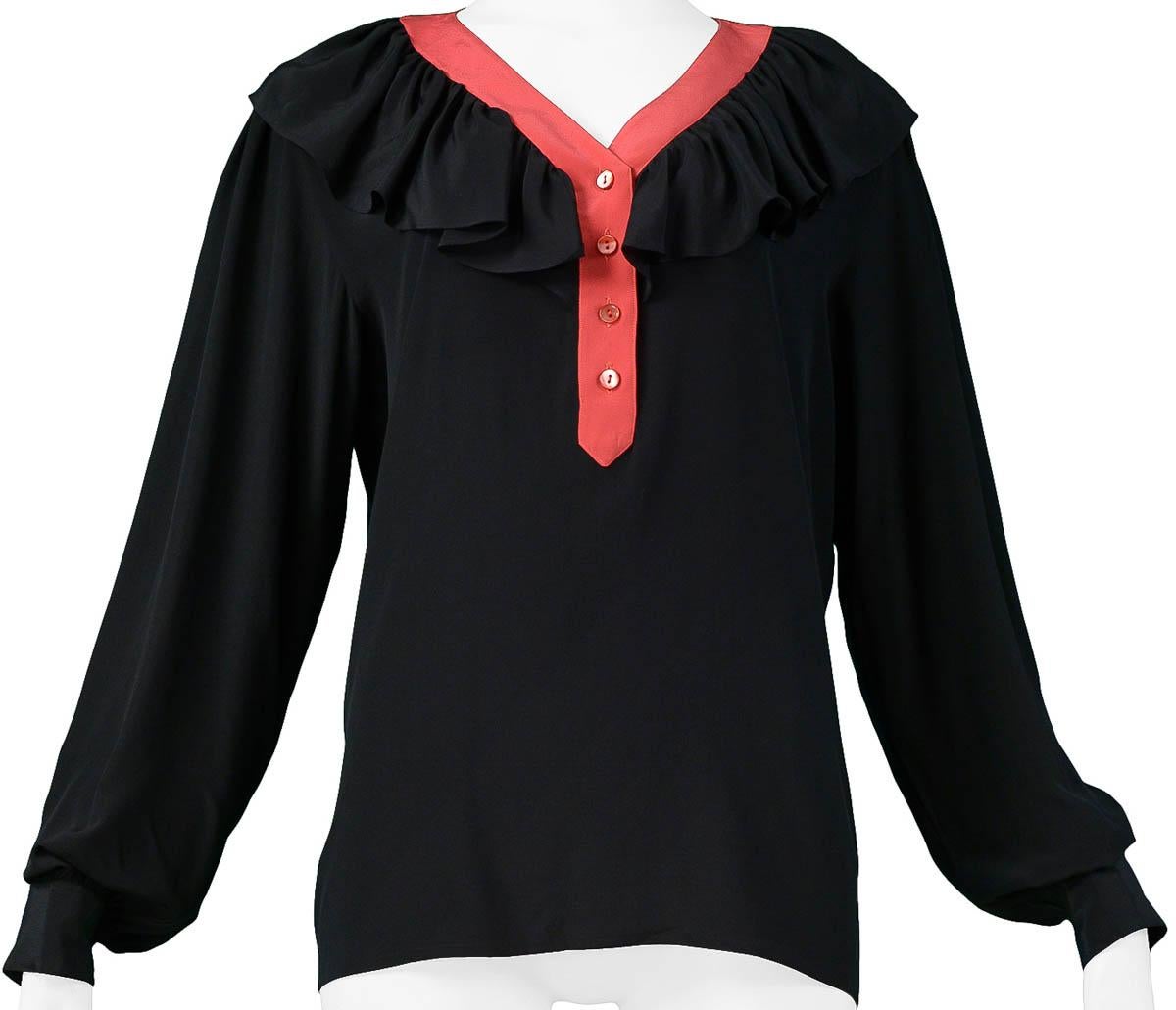 Vintage Yves Saint Laurent black silk blouse with red trim, button front, and ruffle collar.

Excellent Condition. 

Size: 42