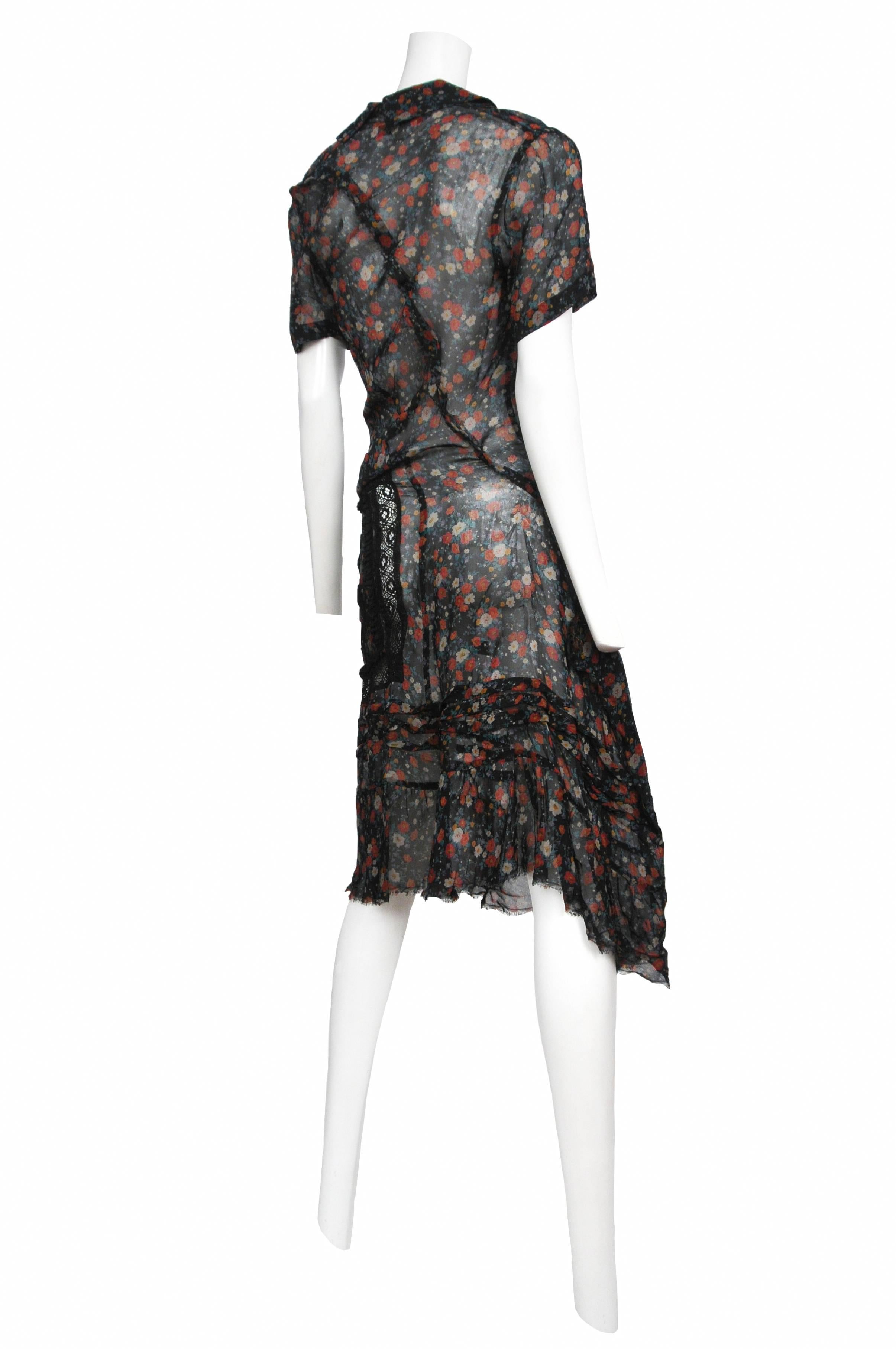 Vintage Junya Watanabe for Comme des Garcons floral & lace twist dress with asymmetrical collar, lace paneling and button up front. Circa Fall/Winter 2007.