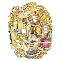 Anillo alemán de oro de 14 quilates de Kabirski Perum con zafiro de talla ovalada fantasía
