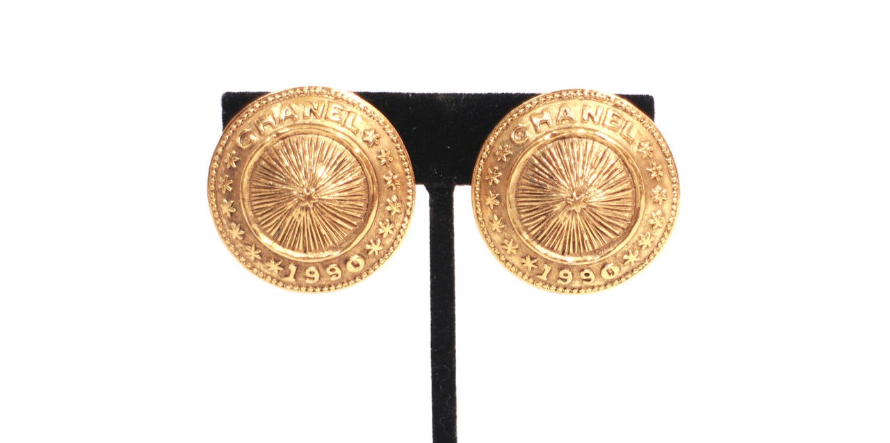 These vintage oversized Chanel earrings are signed and dated 1990. Clip- on, gold tone, excellent condition!

80s-90s era