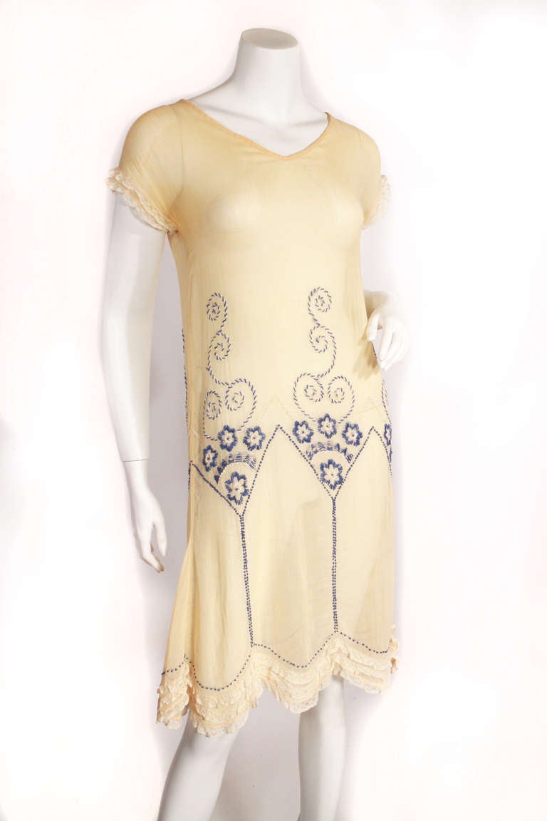 1920s Bohemian dress. Interesting beige color with gorgeous blue fine floral embroidery , and lace ruffles. Light weight and easy to wear.