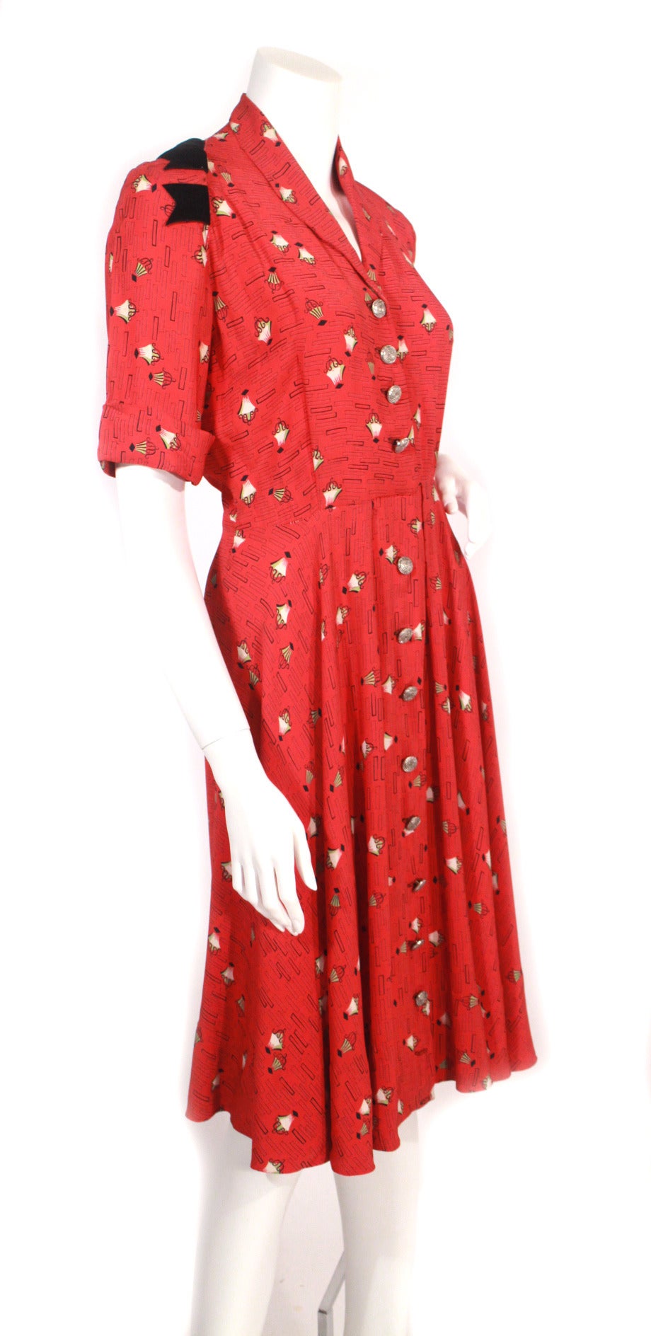 Vintage late 40s early 50s French red print dress. Decorative silver buttons, adorable print, pretty ribbon detail on right shoulder, perfect dress summer to fall.