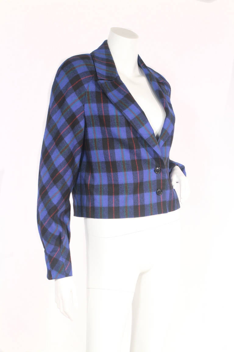 Late 1970's or early 1980's Christian Dior plaid jacket. Can be worn as cropped or not. Very wearable, amazing jacket for fall! Features shoulder pads and tucking at the wrists. Fits XS-Small.