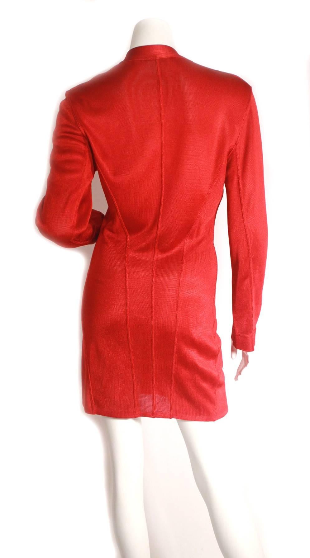 90's Alaia red slinky mini dress. Very low neck line with buttons 5 buttons up with front. Iconic mini and perfect for the fall holiday season!