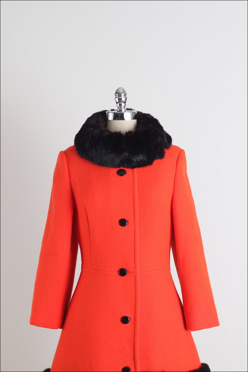 ➳ vintage 1960s coat

* flame red/orange wool
* acetate lining
* rabbit fur collar/hem
* button front
* besom pockets
* by Lilli Ann

condition | excellent 

fits like medium

length 39