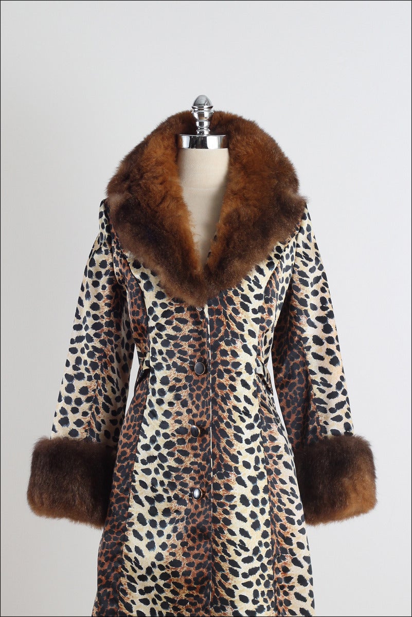 ➳ vintage 1960s coat

* lepard print nylon
* acetate lining
* rabbit fur collar/cuffs
* button front
* besom pockets
* by Lilli Ann

condition | excellent 

fits like medium

length 43