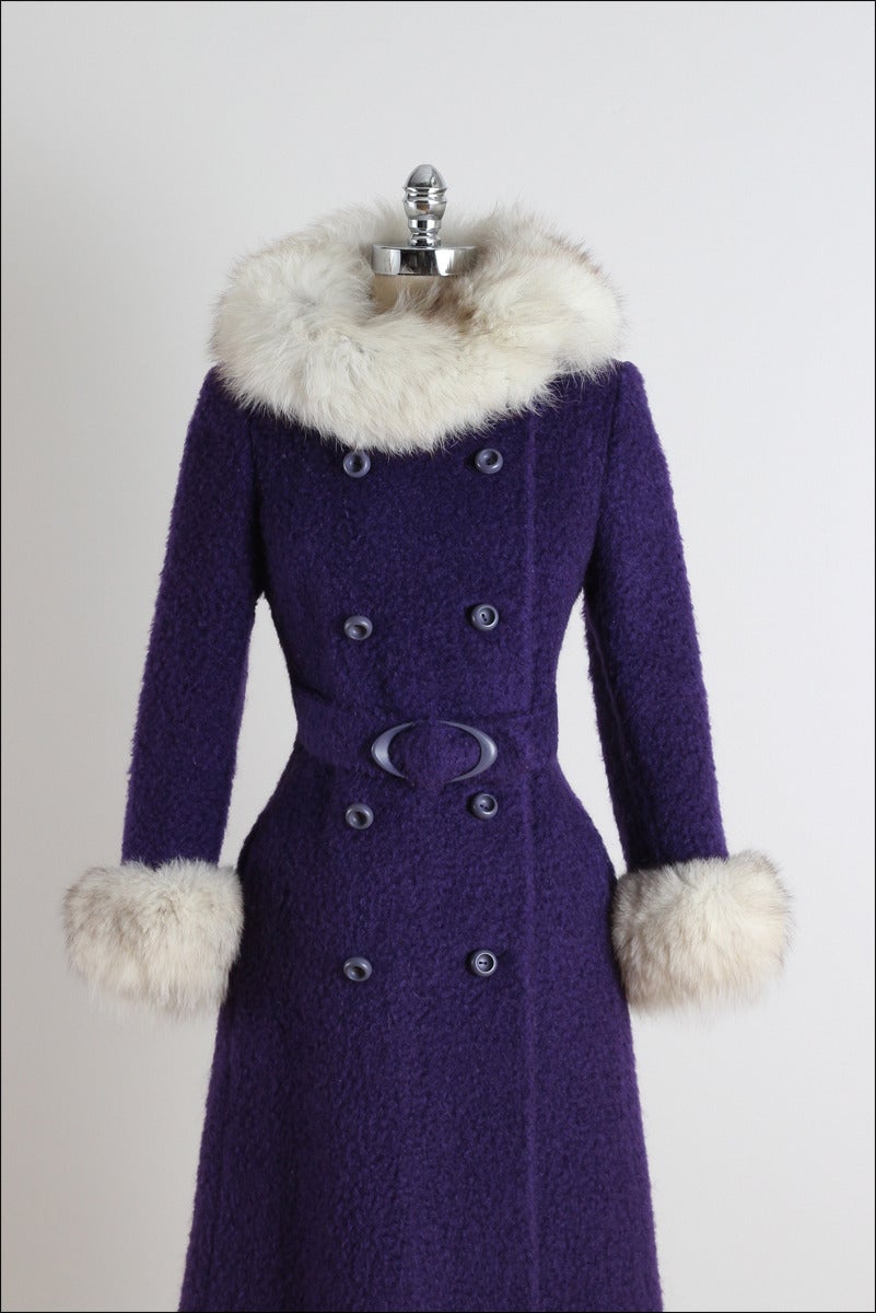 ➳ vintage 1960s coat

* purple wool boucle
* fox fur trim
* acetate lining
* metal snap/button front
* attached belt
* double pockets
* by Nina Originals

condition | excellent

fits like medium

length 42