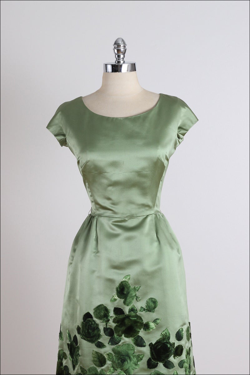 ➳ vintage 1960's dress

* shimmery green satin
* organza lining
* stitched velvet green floral details 
* back zipper
* by Harvey Berin

condition | excellent 

fits like medium

length 39