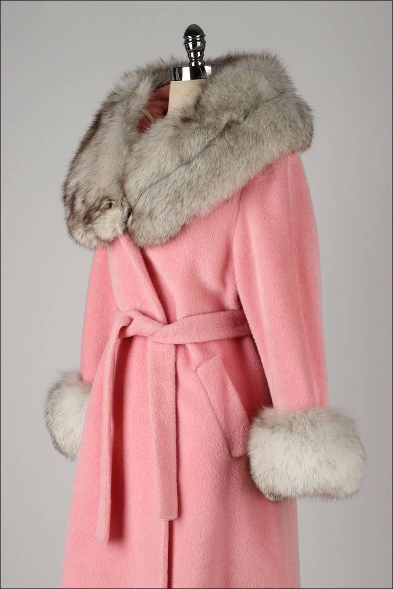 ➳ vintage 1960s coat

* pink wool
* acetate lining
* silver fox collar/cuffs
* removable collar
* besom pockets
* detached tie belt
* by Lilli Ann

condition | excellent 

fits like s/m

length 43