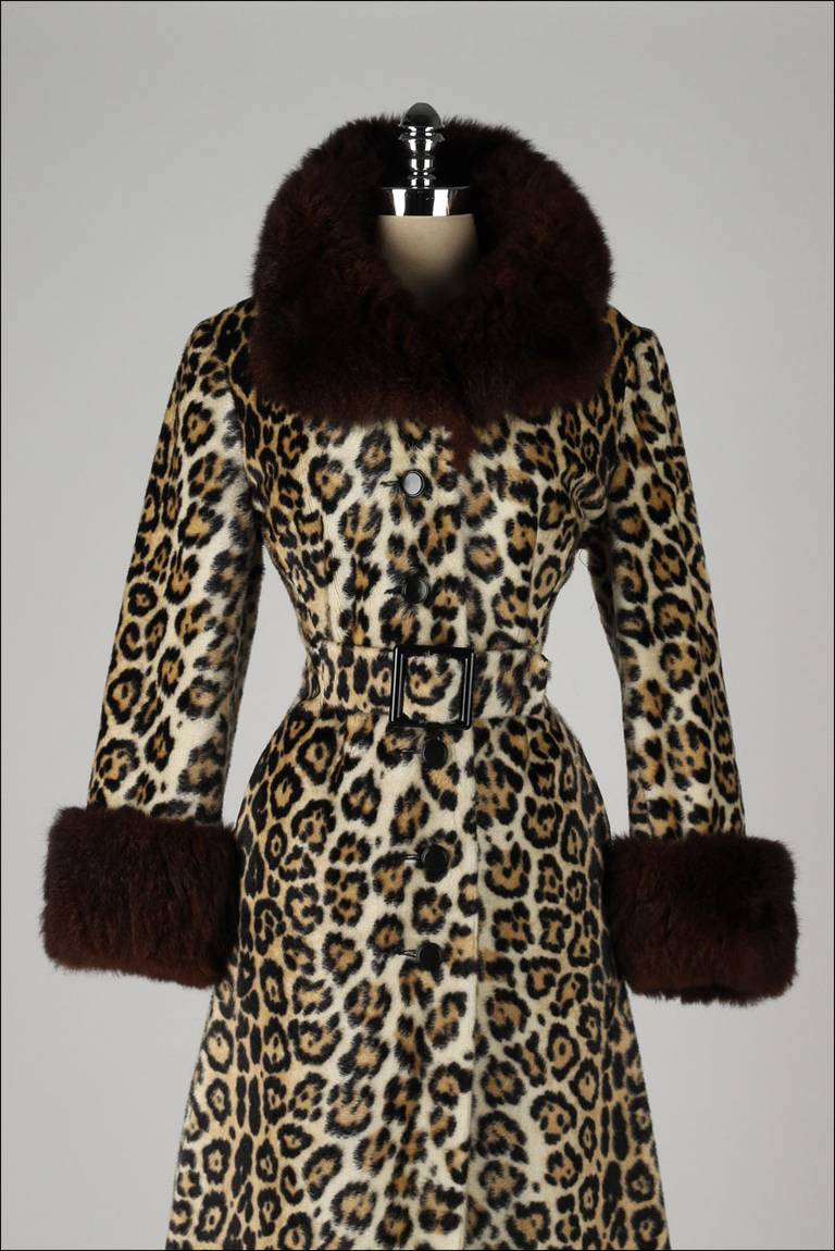 ➳ vintage 1960s coat

* faux leopard print
* acetate lining
* faux rabbit fur cuffs/collar
* besom pockets
* attached belt
* button front

condition | excellent 

fits like s/m

length 44