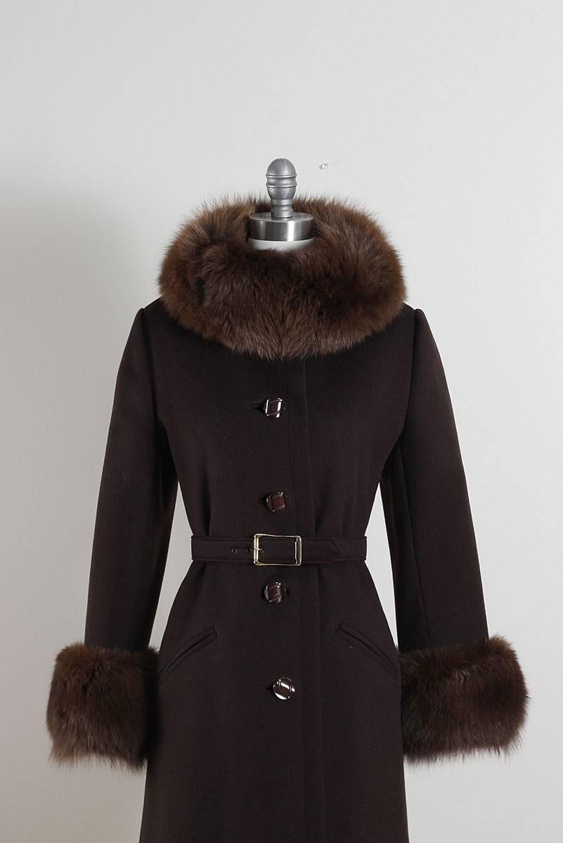 ➳ vintage 1960s coat

* chocolate brown wool
* brown fox fur
* satin lining
* button front
* detachable belt

condition | excellent

fits like medium

length 47