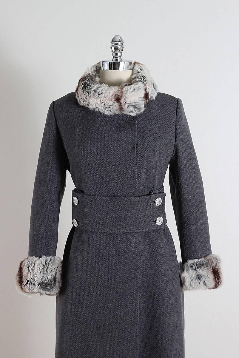 ➳ vintage 1960s dress

* gray wool
* chinchilla fur trim
* acetate lining
* button front
* rhinestone button belt
* pockets
* by Carol Brent

condition | excellent

fits like m/l

length 37