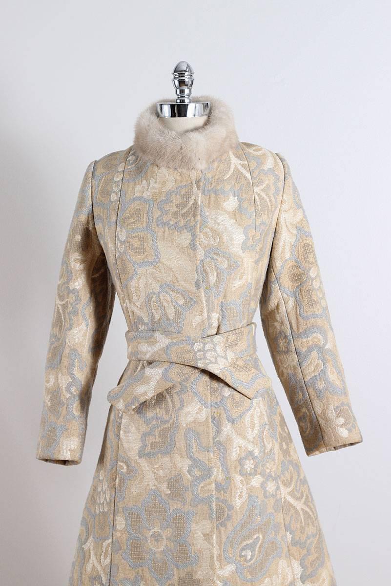 ➳ vintage 1960s coat

* cream wool
* mink fur collar
* satin lining
* tan & blue floral print
* detachable belt
* pockets
* by Golet

condition | excellent

fits like s/m

length 40