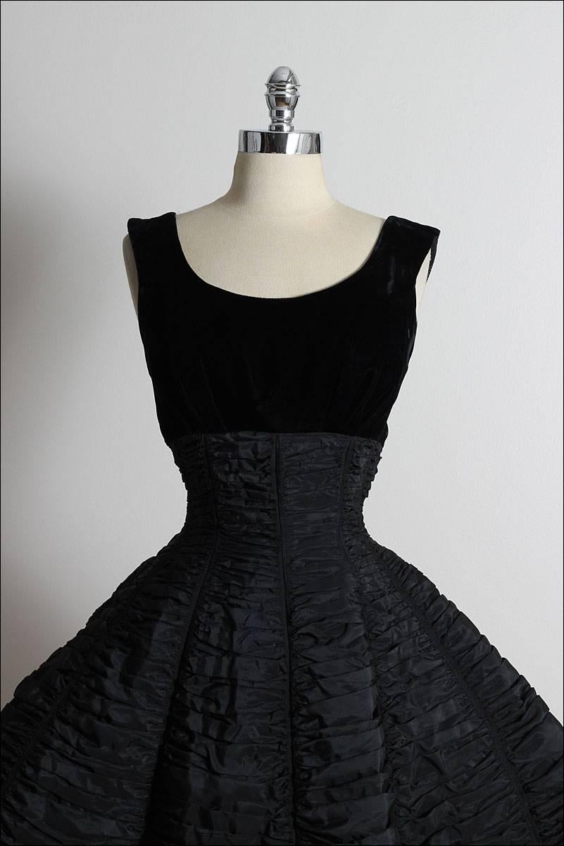 ➳ vintage 1950's dress

* black velvet bodice
* black taffeta skirt
* acetate & pellon lining
* beautiful ruched full skirt
* metal back zipper
* by Suzy Perette

condition | excellent 

fits like xs/s

length 45
