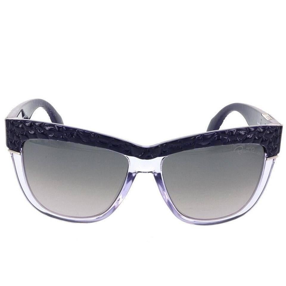 Roberto Cavalli Sunglasses, Lavender Translucent and Purple

For a pair of sunglasses with an attitude to match yours, try on these Roberto Cavalli Rea shades. Purple reptile accents and purple translucent frames will be sure to go with any look,