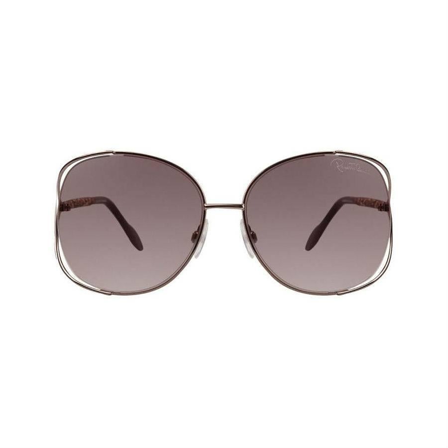 Roberto Cavalli Sunglasses, Brown

Sleek and contemporary, the Roberto Cavalli RC665S provides a striking accent to any look. These stylish sunglasses feature a rounded metal frame in bronze with cutaway brown gradient lenses. Accenting the frame