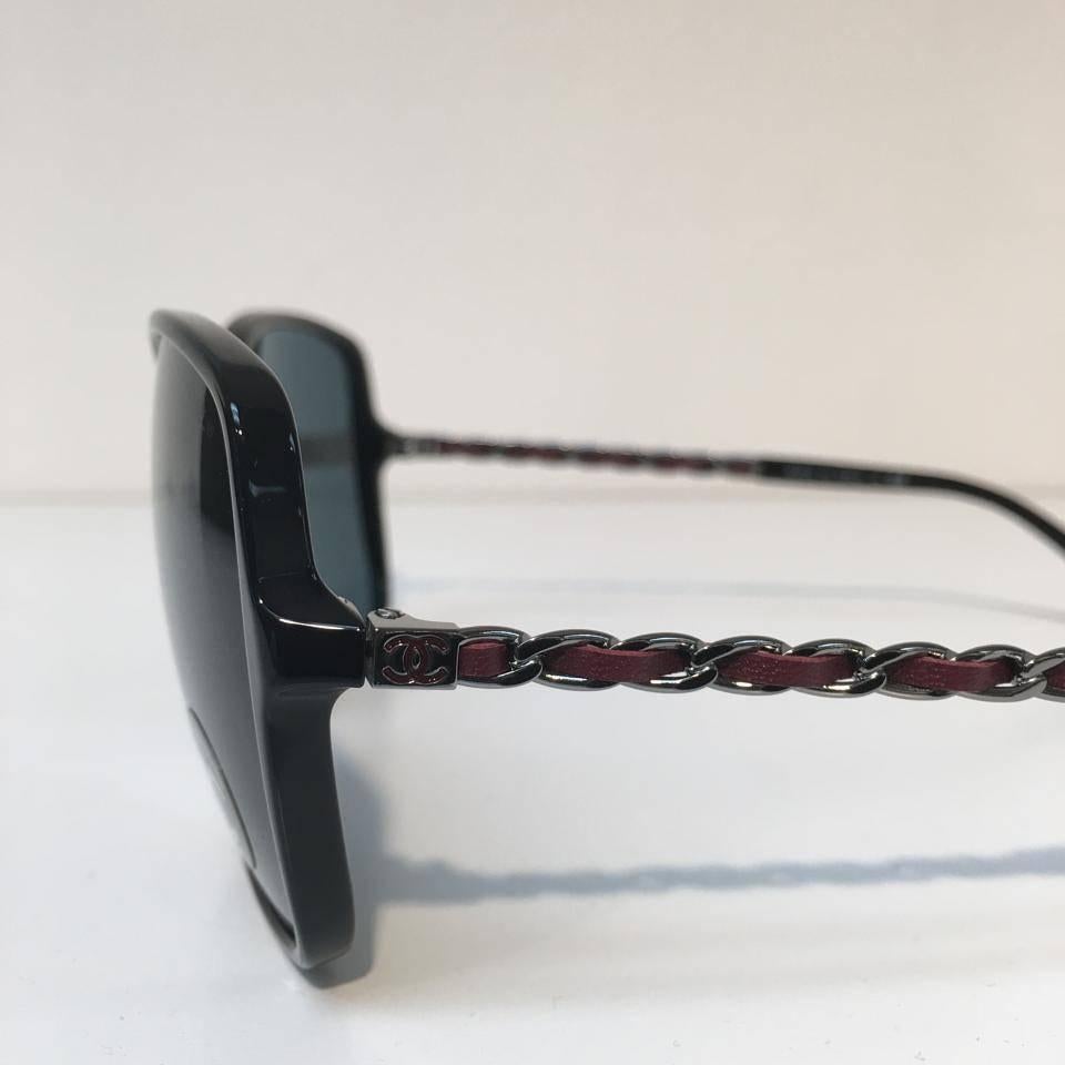 Chanel Sunglasses, Black and Silver (CH5210Q)

Brand new, never used and in excellent condition

Glamorous, feminine and exquisite Chanel sunglasses for women, this dramatically oversized design features a black square shaped frame with rounded