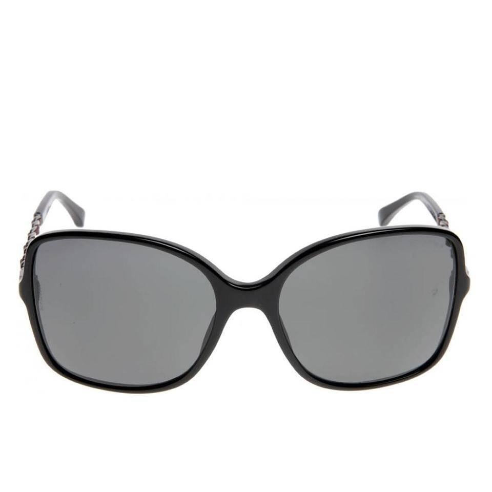 Chanel Sunglasses, Black and Silver (CH5210Q)

Brand new, never used

Glamorous, feminine and exquisite Chanel sunglasses for women, this dramatically oversized design features a square shaped black frame with rounded inner sections for a