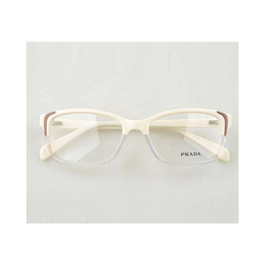 Prada Eyeglasses, Ivory Gradient Ice

The Prada PR 23OVA eyeglasses have been tailored to help keep you at the height of style whilst remaining comfortable during the day. PR 23OV eyeglasses come in a variety of suitable frame colors. This