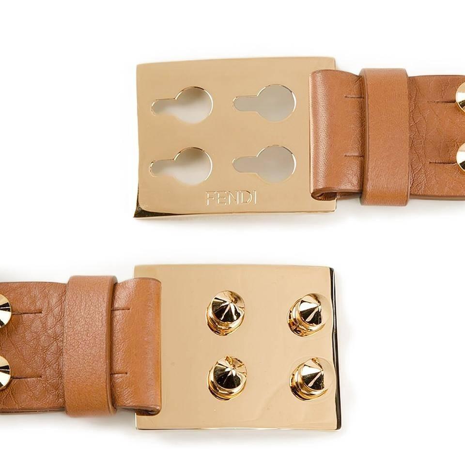 Fendi Studded Leather Belt, Brown

Define your silhouette in immaculate style with Fendi brown leather belt with gold embellishment. Wear it to cinch the waist of everything from fall knits to sharp tailoring.

Features:
o 100% Authentic Fendi