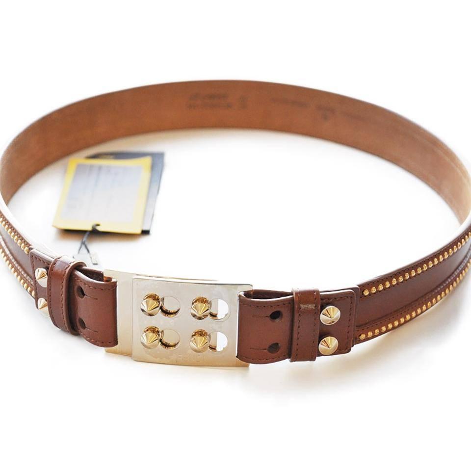 Fendi Studded Leather Belt, Brown

Define your silhouette in immaculate style with Fendi brown leather belt with gold embellishment. Wear it to cinch the waist of everything from fall knits to sharp tailoring.

Features:
o 100% Authentic Fendi