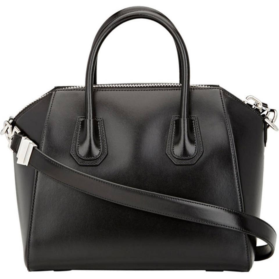 Givenchy Antigona Small 2way Duffel Satchel, Black

The Antigona, Inspired by the Greek goddess, this bag embodies strength and authority with its sharpened trapezoid design, triangular military patch, and Givenchy's urban couture signature