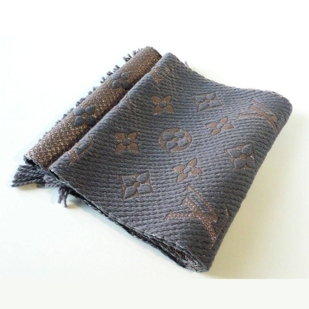Louis Vuitton Logomania Shine Wool Scarf, Gray Lurex (M70467)

Make the most of winter with the Logomania Shine scarf. In a soft, warm blend of wool and silk with Lurex for shine, it is adorned with an oversize version of the iconic Monogram