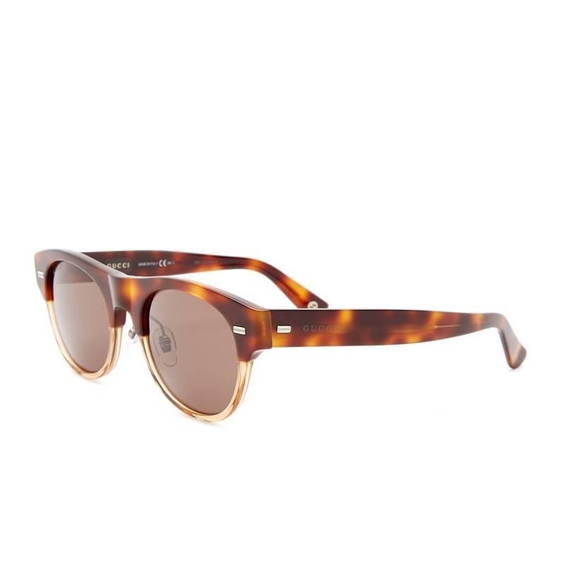 Gucci Sunglasses, Havana

Giving off both a serious and outgoing appearance, these Gucci GG1088S Sunglasses provide a Havana semi-rimmed single bridge oval frame which is augmented by thick tapering paddle arms. The style is contrasted by the