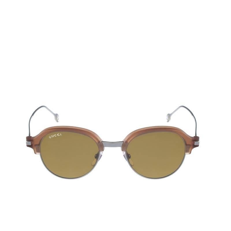 Gucci Sunglasses, Brown Ruthen

Graced by an awe inspiring artistic flare, these Gucci Sunglasses are impressively defined by their brown semi-rimmed single bridge oval frame which is supplemented by the gunmetal lower frame. The sleek and slender