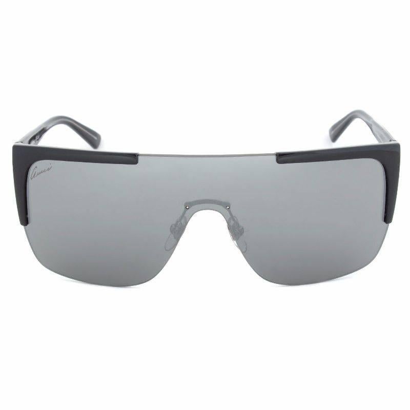 Gucci Sunglasses, Black Gray

Featuring a thoroughly engaging contemporary design, these Gucci Sunglasses incorporate a semi-rimmed black frame accompanied with grey mirrored shield lenses while this ultra-modern design is accentuated with black