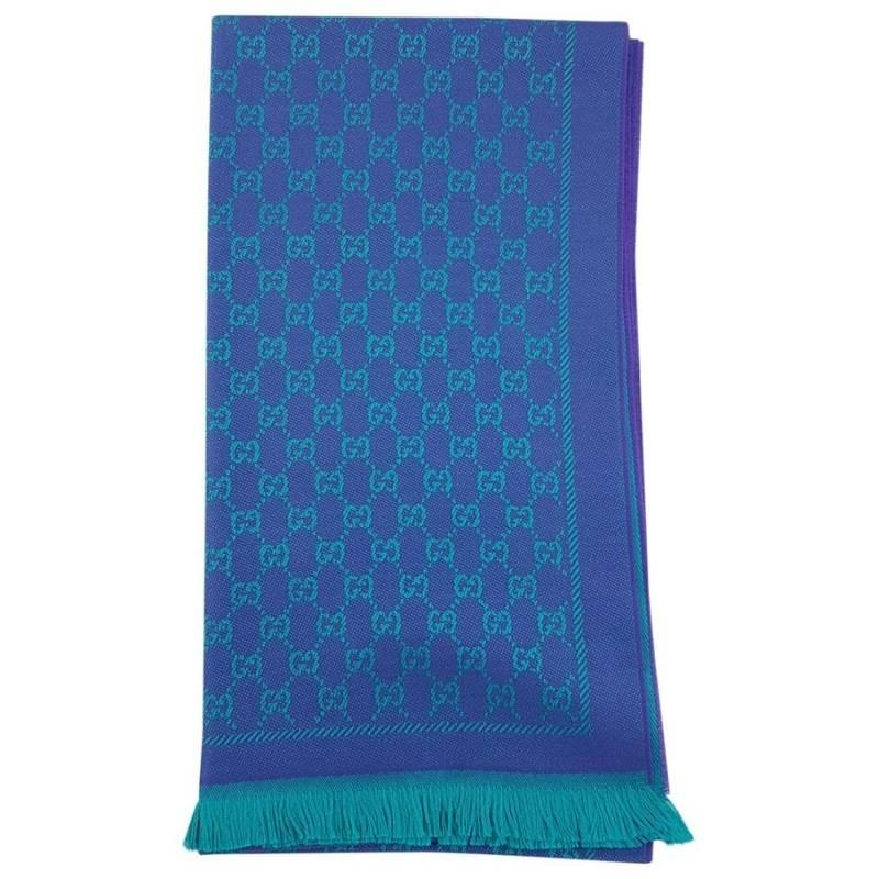 Gucci GG Jacquard Wool Scarf, Purple and Green

Make the most of winter with this GG jacquard wool scarf from Gucci. 

Features:
• 100% Authentic Gucci Scarf
• Designed in purple and green color
• Fabric: 100% Wool
• Color: Purple and Green
• Size: