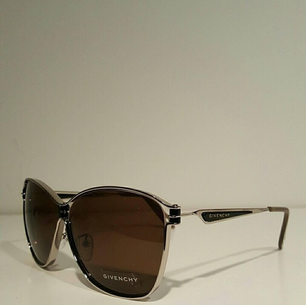 Givenchy Oval Sunglasses
Color: Black/Silver
Size: OS

Brand new with box.
Unused condition.
No flaws.
Made in Italy.