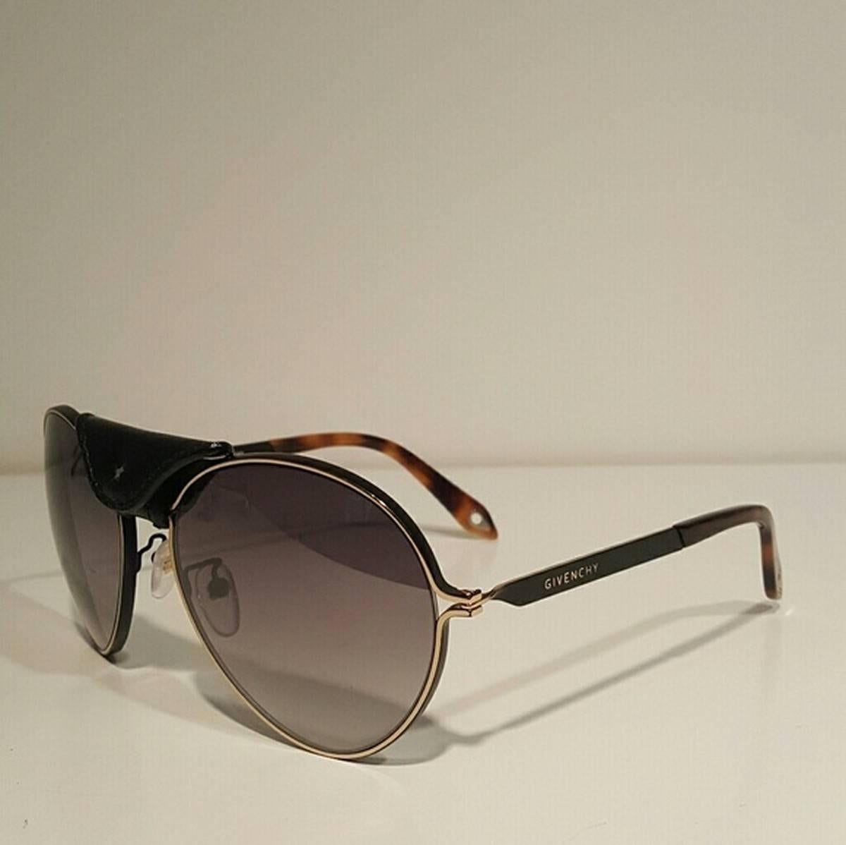 Givenchy Gold Aviator Sunglasses
Color: Gold
Size: OS

Brand new with box.
Unused condition.
No flaws.
Made in Italy.