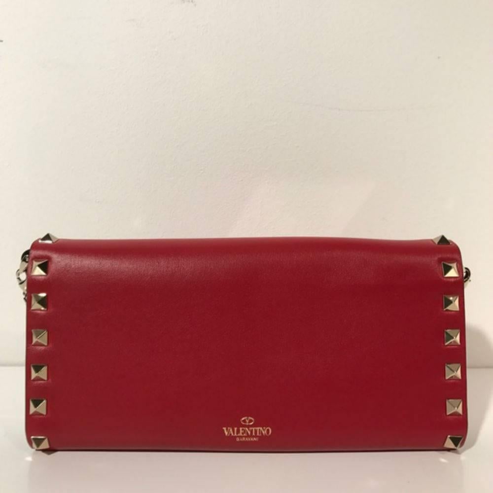 Valentino Rockstud Wallet on Chain Red

Mint condition with no signs of wear. 
Detachable gold chain. 
Box included. 
Made in Italy. 
Price is firm.
Color: Red 
